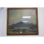 AFTER PAUL HENRY, a colour print of connemara cottages and mountains, framed and glazed,