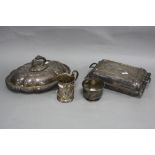 A VICTORIAN SILVER MUG, 'S' scroll handle, embossed with a boy and girl, foliate cartouche