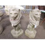 A PAIR OF PRE-CAST 'LION' GARDEN FIGURES, approximate height 57cm