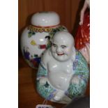 A SEATED CHINESE PORCELAIN BUDDHA, and a Chinese ginger jar (2)