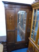 AN EDWARDIAN MAHOGANY INLAID MIRROR DOOR WARDROBE