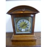 AN OAK CASED BRACKET CLOCK (key and pendulum)