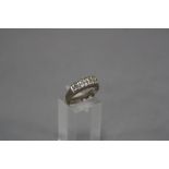 A LATE 20TH CENTURY DOUBLE ROW ETERNITY RING, fourteen modern round brilliant cut diamonds, total