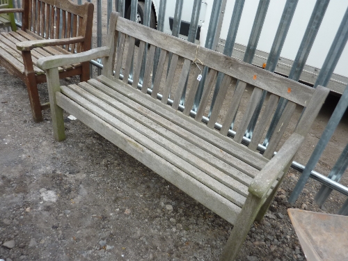 A HARDWOOD SLATTED GARDEN BENCH, approximate length 153cm