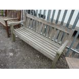 A HARDWOOD SLATTED GARDEN BENCH, approximate length 153cm