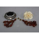 A MOURNING BROOCH, set with a agate, ivory Victorian purse and a pair of earrings