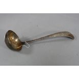 A LATE 19TH CENTURY DUTCH WHITE METAL SOUP LADLE, .833 standard, date latter for 1861, weight