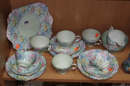 A SHELLEY MELODY PATTERN TEA SERVICE, comprising six cups, six saucers, six tea plates, milk jug,