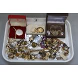 A TRAY OF MIXED COSTUME JEWELLERY, to include two watches, cufflinks, badges, buttons, etc