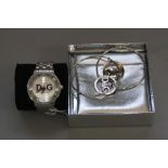 A DOLCE AND GABBANA 2008 GENTS WRIST WATCH, boxed, together with a pair of Dolce and Gabbana