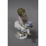 A BOXED LLADRO FIGURE, 'My Best Friend' No 7620, signed by Juan V Lladro 23-5-93