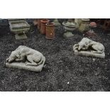 TWO RECUMBENT DOG GARDEN FIGURES, standing 33cm high and 72cm long