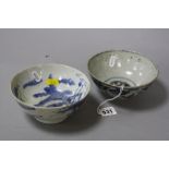 TWO CHINESE BLUE AND WHITE BOWLS, one decorated with dragons, marks to base, diameter