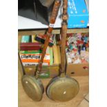 TWO 19TH CENTURY BRASS AND COPPER WARMING PANS, on turned wooden handles (2)