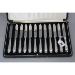 A CASED SET OF TWELVE GEORGE V SILVER HANDLED FRUIT KNIVES, maker John Biggin, Sheffield 1927