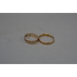 A 22CT WEDDING BAND, and another ring sizes M & H, approximate weight 2.7 grams