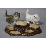 TWO BESWICK PERSIAN CATS, No.1898, grey gloss and white matt, together with Beswick display stand