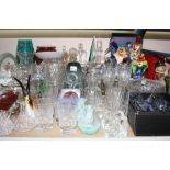 A quantity of glassware, INCLUDING DECANTERS, VASES, Murano type glass including clowns, celery