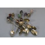 TWELVE SILVER GEM SET SPOONS