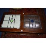 TWO ART DECO STYLE LEADED WINDOWS, approximate size width 46cm x 41.5cm (damaged glass to one