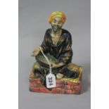 A ROYAL DOULTON FIGURE 'The Mendicant' HN1365