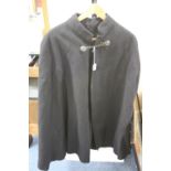 A BLACK 'POLICE' CAPE