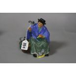 A ROYAL DOULTON FIGURE, 'Tuppence a Bag' HN2320