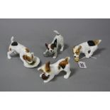 FOUR ROYAL DOULTON CHARACTER DOGS, 'Running with Ball' HN1097, 'With Ball' HN1103, 'With Plate'