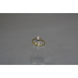 AN 18CT GOLD MODERN SINGLE STONE DIAMOND RING, one modern round brilliant cut diamond, estimated