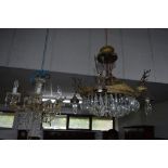 A BRASS CHANDELIER, with four reindeer heads and glass droppers and another glass chandelier (2)