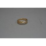 AN 18CT DIAMOND RING, size N