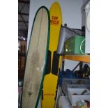A CIRCLE ONE LIFE SAVING SURF BOARD, approximate length 10' 7', epoxy made with 8' fin, Badged