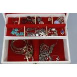 A JEWELLERY BOX WITH VARIOUS SILVER JEWELLERY, including rings, chains, etc