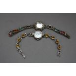 TWO SILVER WATCHES, set with semi precious stones