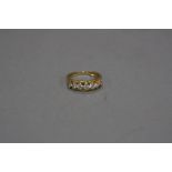 A LATE 20TH CENTURY DIAMOND HALF ETERNITY RING, seven modern round brilliant cut diamonds claw