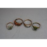 A COLLECTION OF FOUR GEM SET RINGS, to include a late Victorian coral and pearl half hoop ring, ring