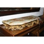 A GILT FRAMED CONSOLE WITH ONYX TOP