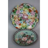 A JAPANESE CLOISONNE CHARGER WAVY RIM, the whole decorated with flower heads and foliage,