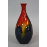 A ROYAL DOULTON SUNG FLAMBE BALUSTER VASE, predominantly red and blue glazes, height approximately