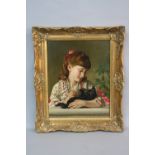 INITIALLED RB, late 19th Century, head and shoulders portrait of a young girl cradling a black