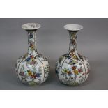 A PAIR OF 19TH CENTURY CHINESE PORCELAIN ONION VASES, vertical gilt bands between polychrome