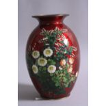 A JAPANESE CLOISONNE VASE, by Ando Jubei, having flowering foliate decoration to Pigeon blood red