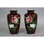 A PAIR OF JAPANESE GINBARI RED GROUND CLOISONNE BALUSTER VASES, textured bodies with bird and