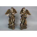 A PAIR OF VICTORIAN STYLE COMPOSITION FIGURAL ANGELS, with arms outstretched to sides, gilt wings