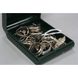 A BOX OF MIXED SILVER RINGS