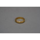 A 22CT WEDDING BAND, approximate weight 7.1 grams, ring size L