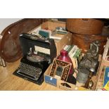 TWO TIN HAT BOXES, wooden bagatelle board, Remington model 5T portable typewriter, a box of Henry