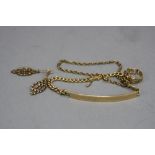 A GOLD COLLECTION OF JEWELLERY, to include a modern identity bracelet, plain curved panel fitted