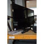 A SAMSUNG 32' LCD TV, (remote