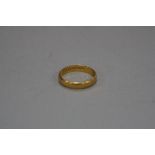 A 22CT WEDDING BAND, approximate weight 4.4 grams, ring size R